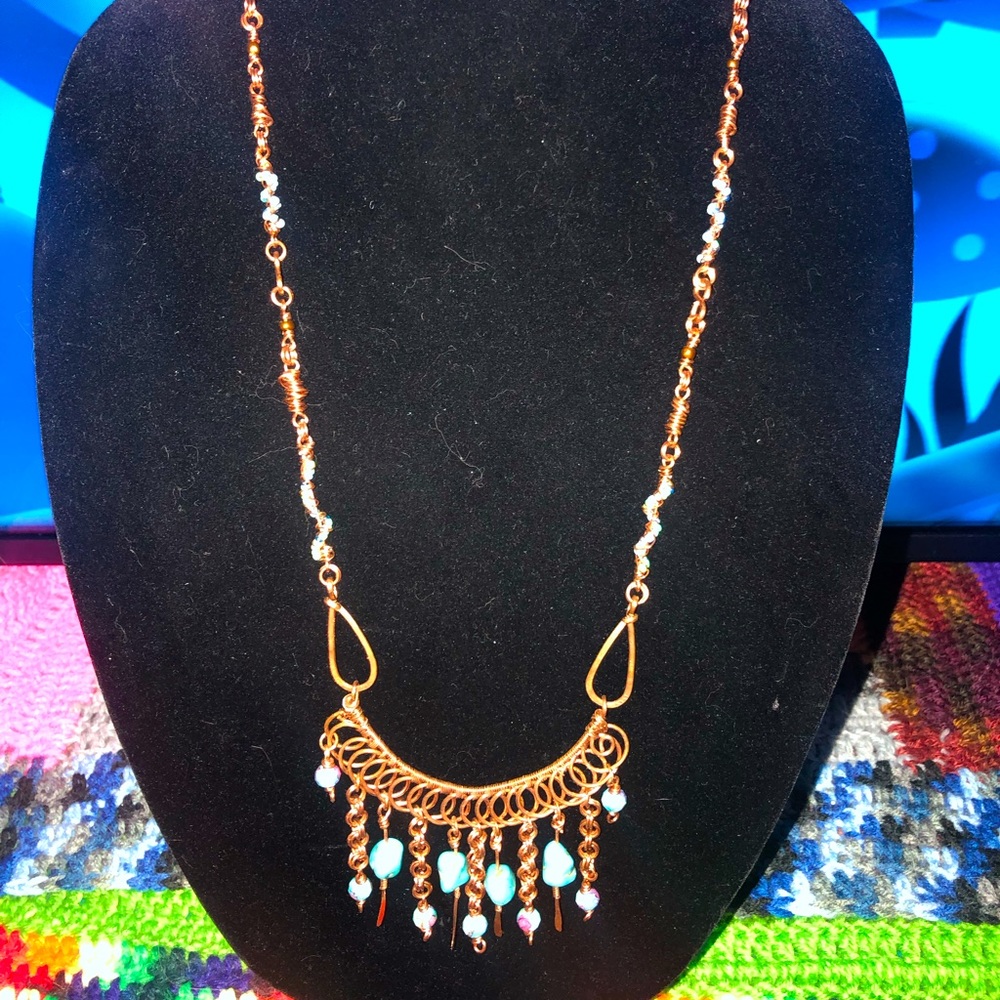 Stunning turquoise and copper necklace.